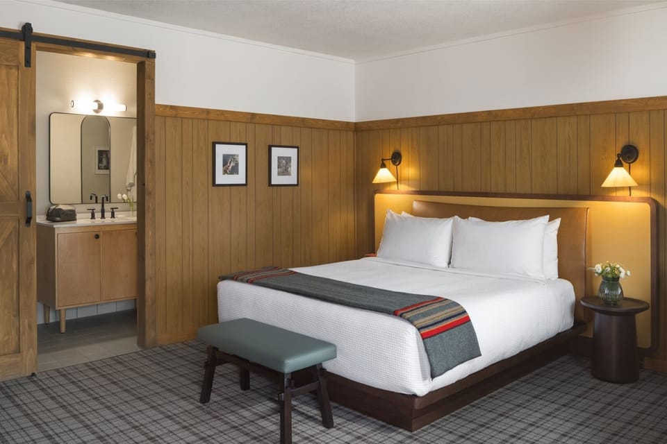 Settle in for a restful night with warm bedside lighting.