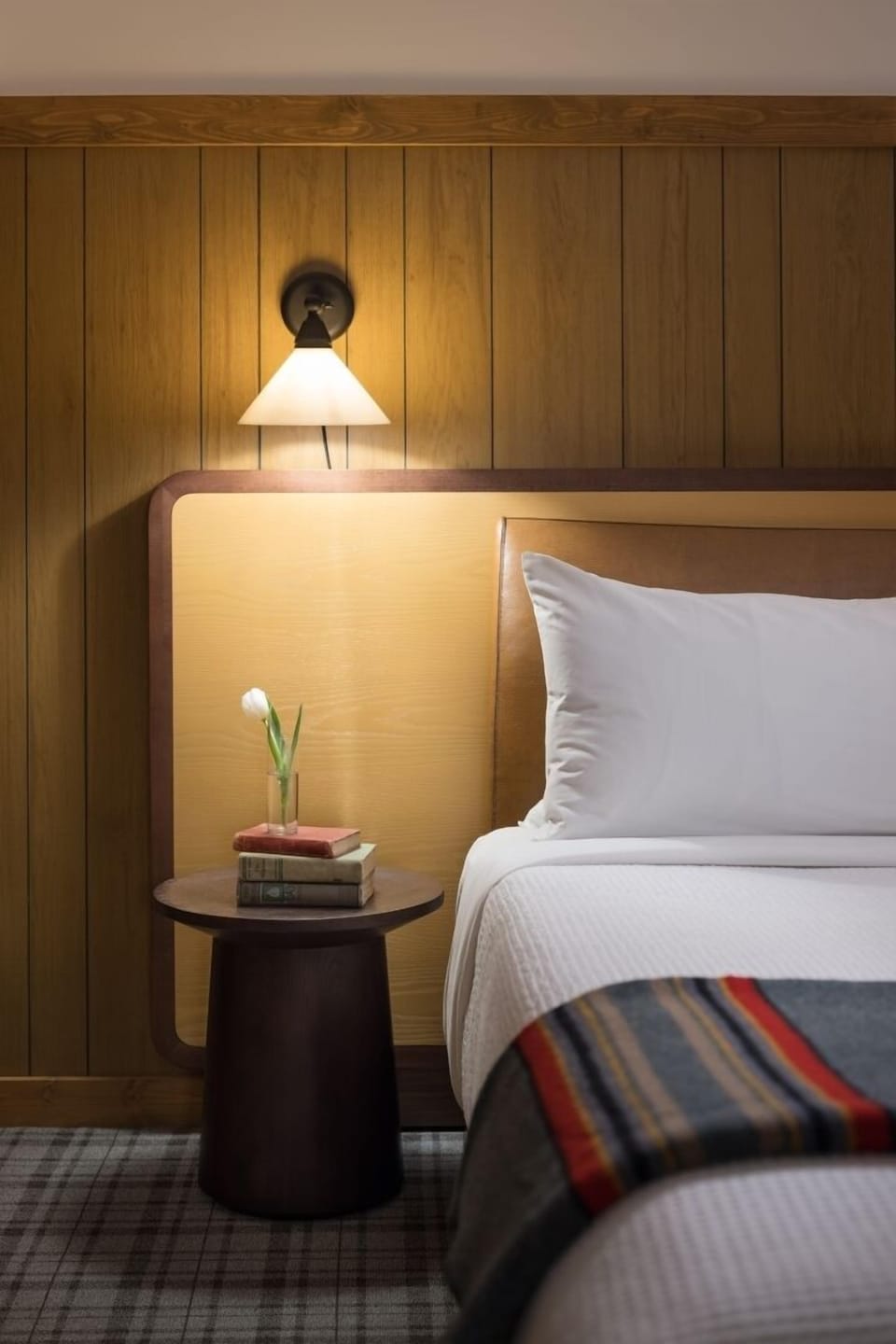 Wake up gently beside soft lighting and cozy textures.