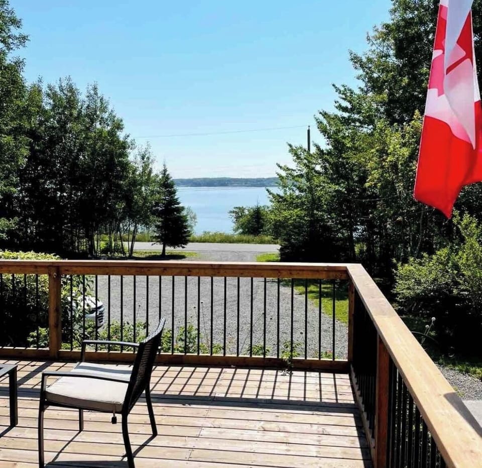 Front deck looking out to the beach and water views 