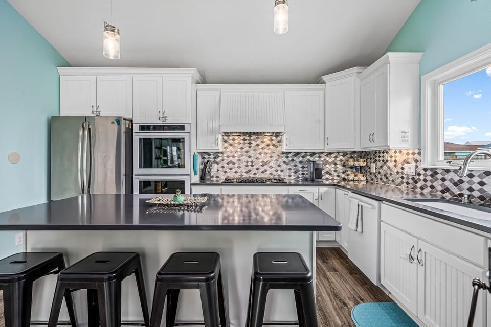 Kids Love The Breakfast Bar! - They will look forward to feeling like they are in a restaurant with the bar into the kitchen. Everyone loves made to order food!