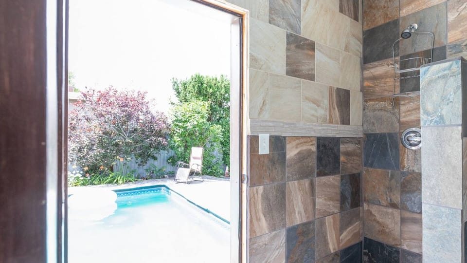 King room bathroom leads and serves to pool 