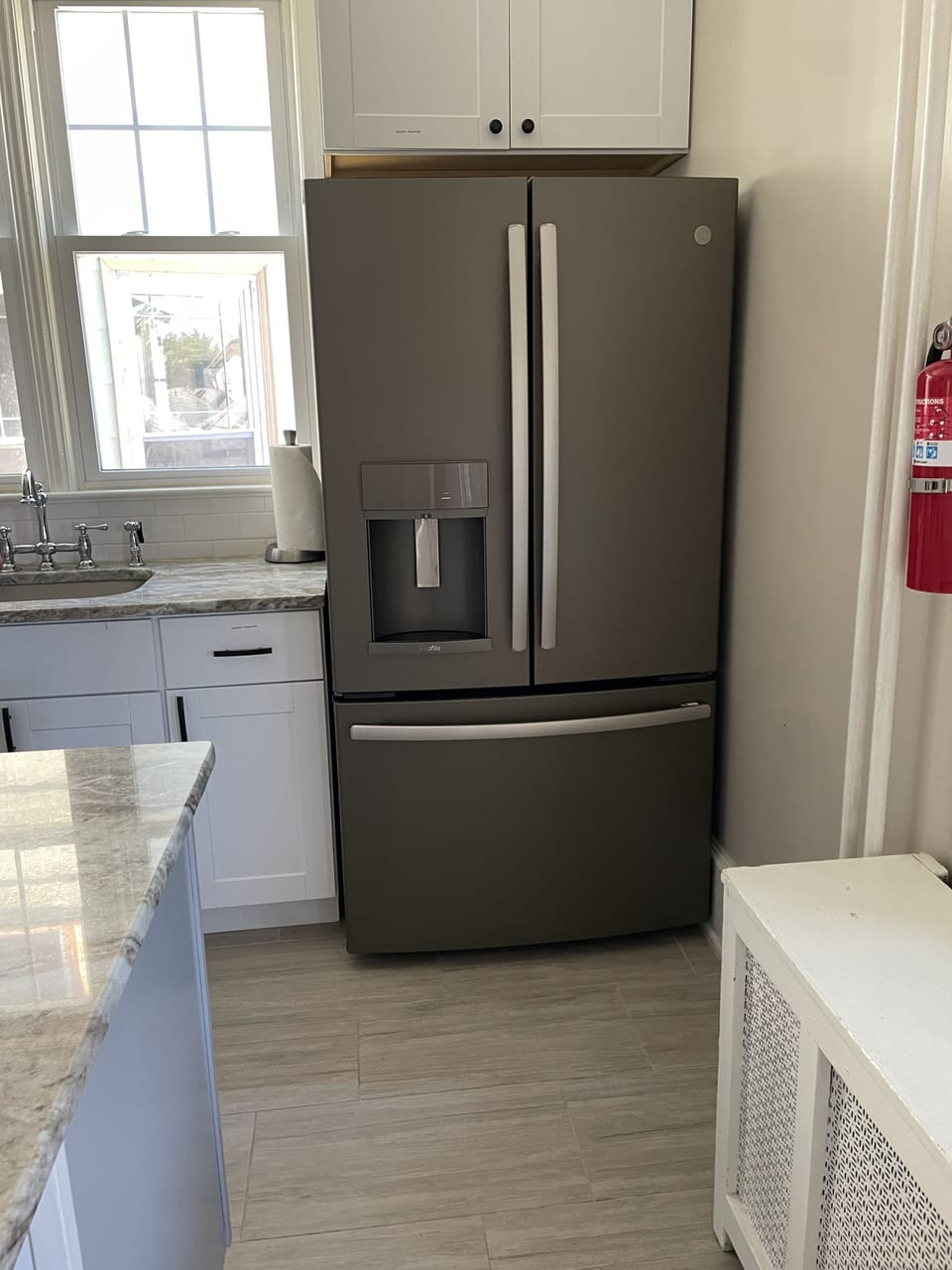 Family sized refrigerator with two ice-makers