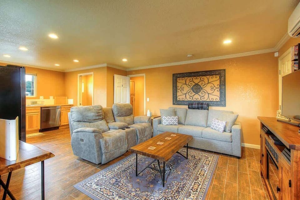 Cuddle up in front of the gas fireplace and watch tv in the cozy living room on the sofa with a pullout bed.