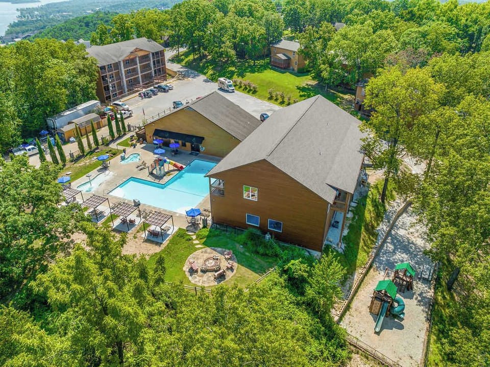 Bird's Eye view of Community Indoor and Outdoor Pool, Playground, and Fire Pit