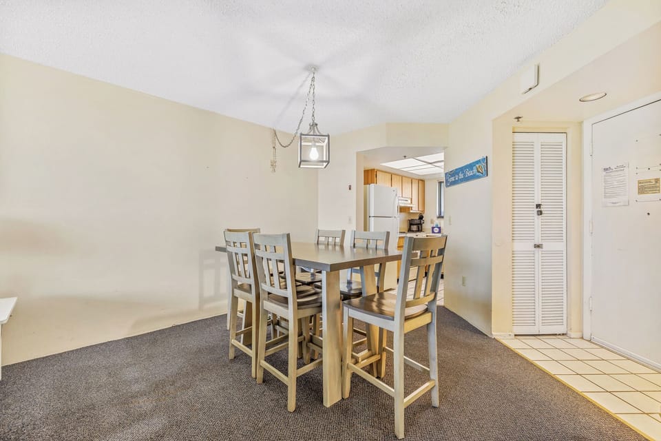 The dining room table accommodates up to 6 guests.