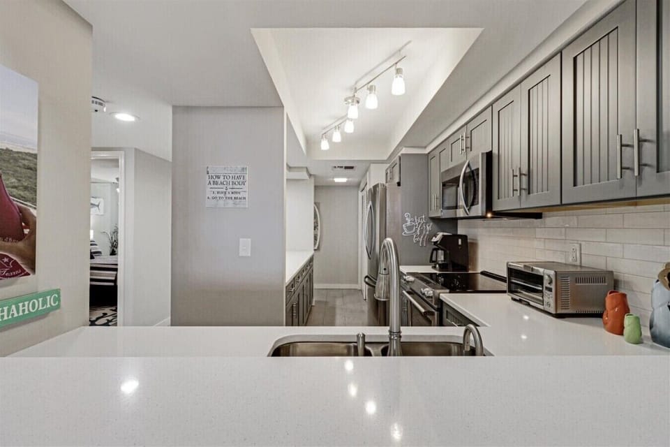 Fully Equipped Kitchen with Stainless Steel Appliances
