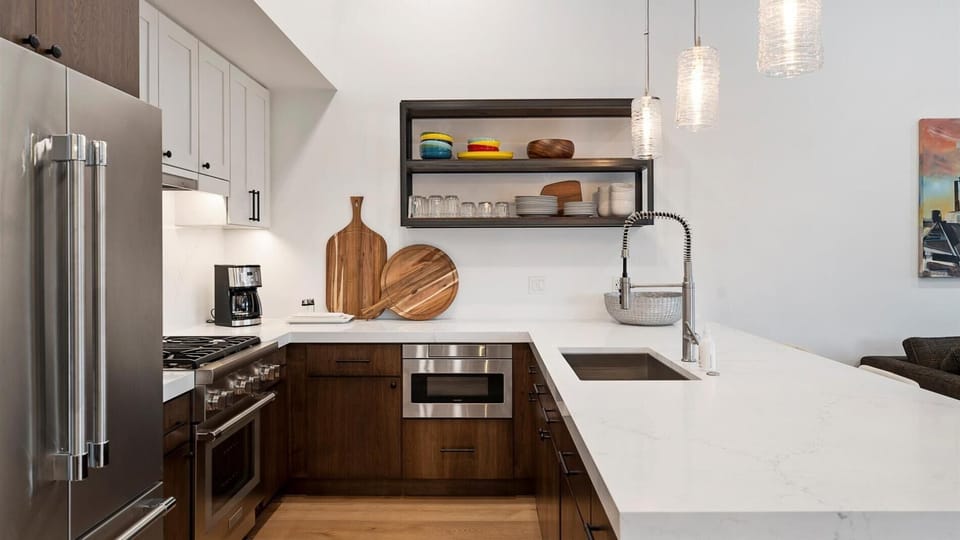 This fully stocked kitchen features are the cookware and appliances one would need to make the meal of their dreams.