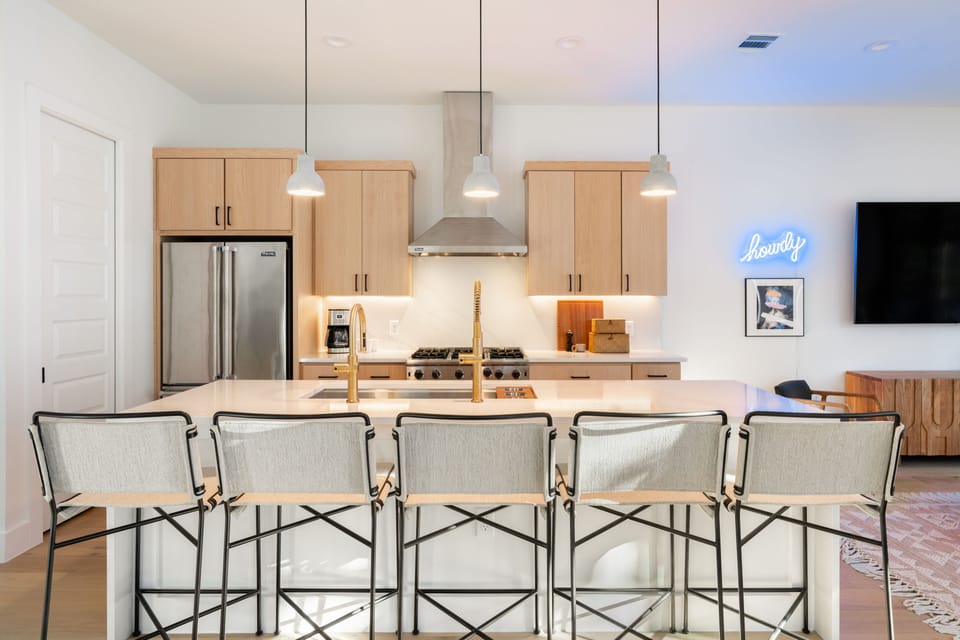 Kitchen with breakfast bar seating.
