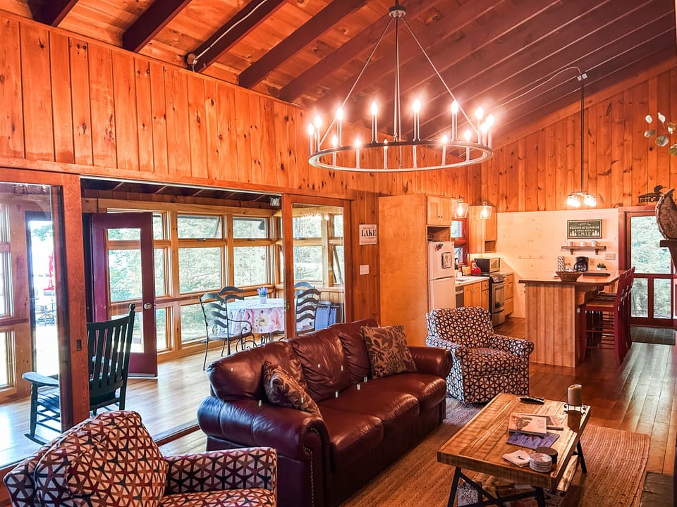 Open concept living room/kitchen w/large double doors that open up to the porch.