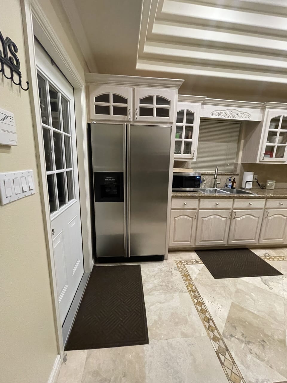 Garage entry, kitchen fully equipped with kitchen aid appliances. 