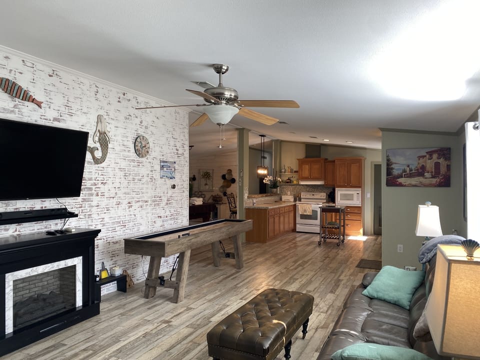Shuffle board, smart tv, reclining sofa