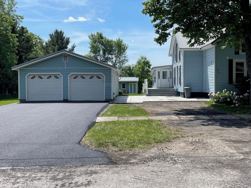 New driveway.  Plenty of space for a boat w/ outdoor outlet to charge batteries