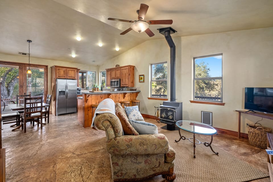 Upon entering, you are introduced to this cozy open layout for e