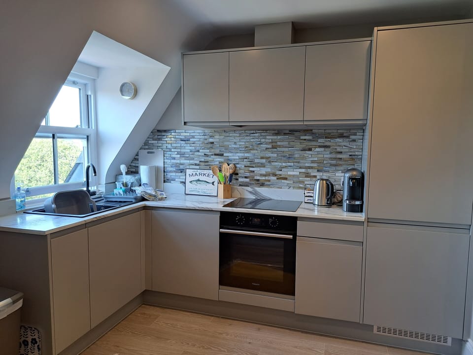 Open plan light and airy fully equipped kitchen
