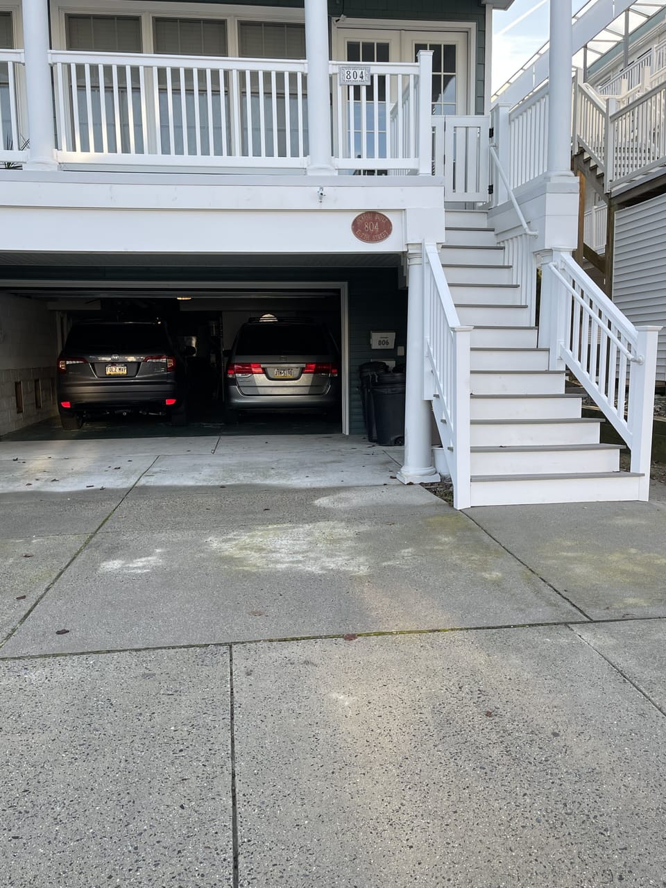 Two parking spaces (shared garage) - one in the garage and one in the driveway. 