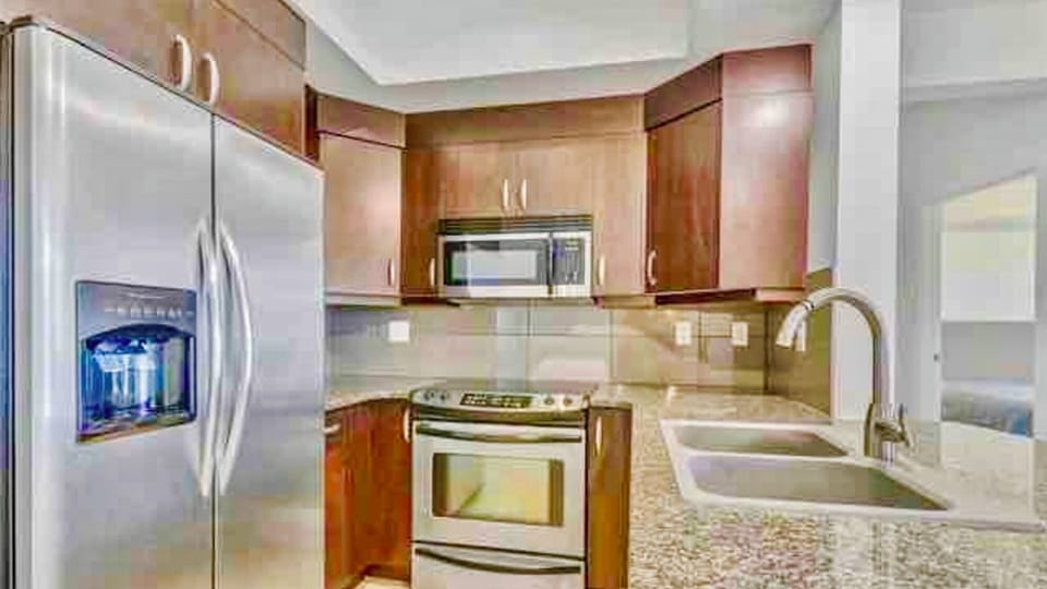 Fridge has ice maker, water dispenser, we stock toasters coffee pots blenders ++