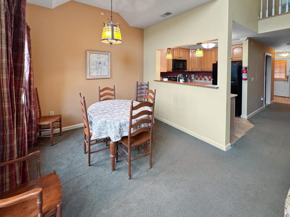 Cozy dining area with open kitchen for family meals
