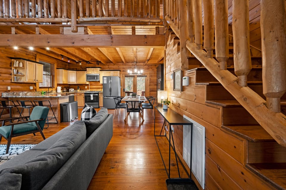 Modern and newly furnished living room and kitchen.  Enjoy time by the fireplace