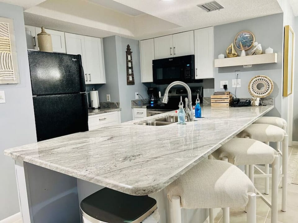 Kitchen with bar and seating