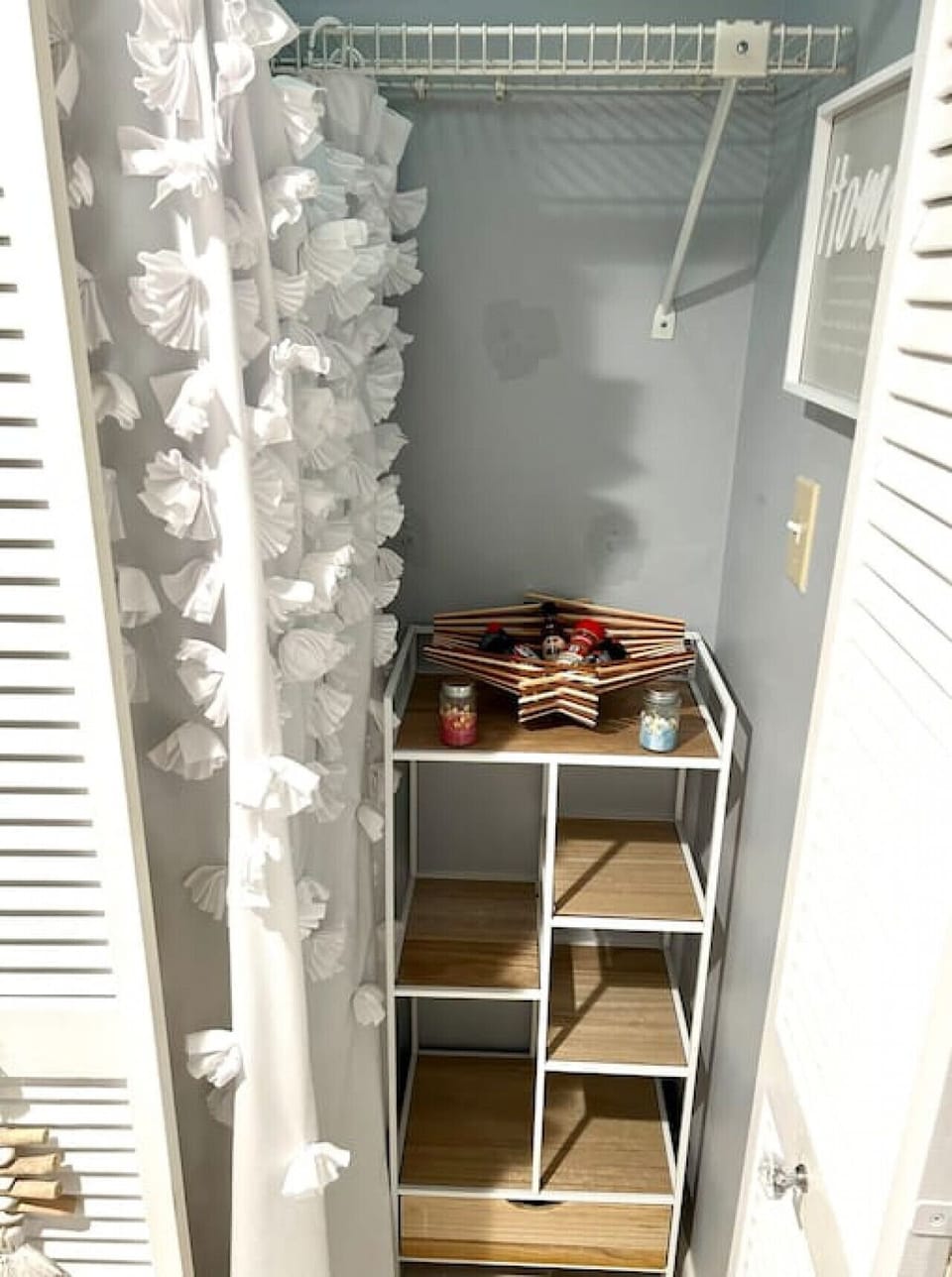 Additional pantry/storage closet located in the hallway entrance area off of the kitchen