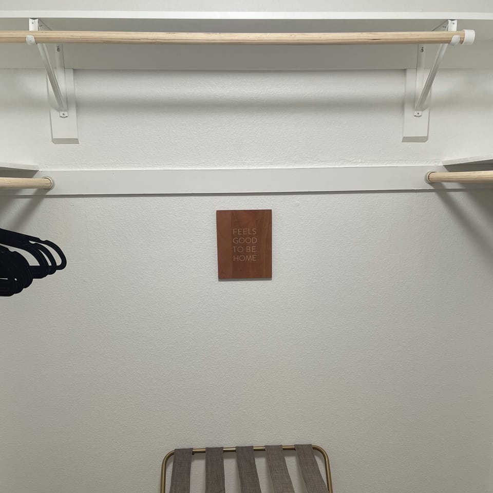 Walk-in closet in primary bedroom