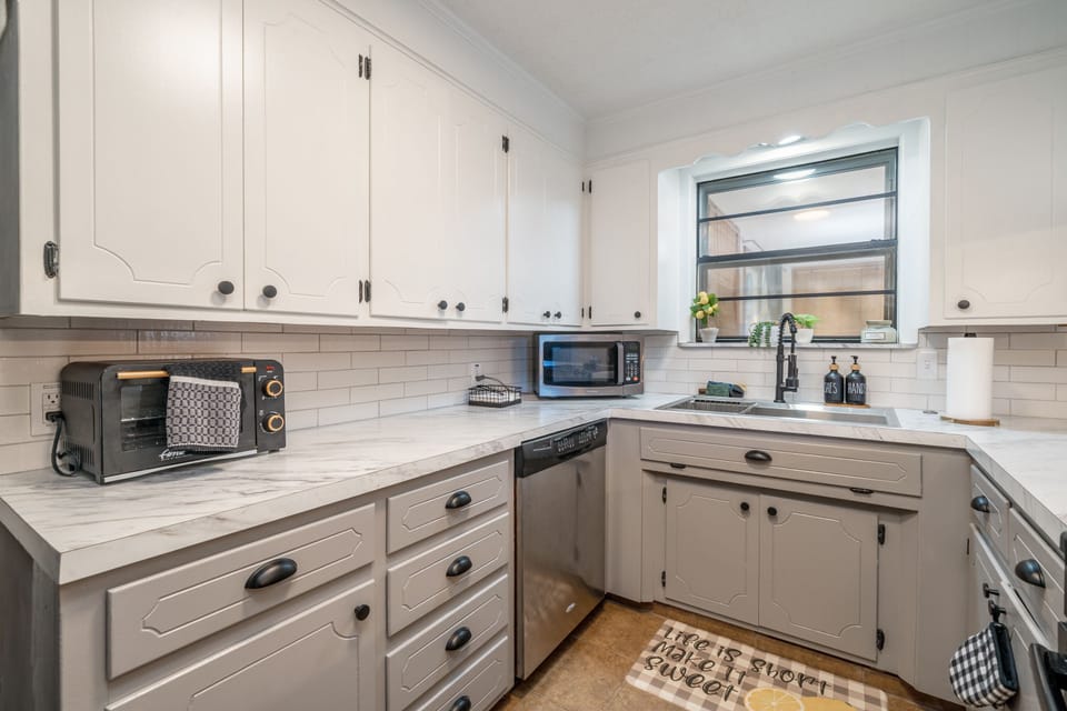Toaster over, dishwasher in kitchen