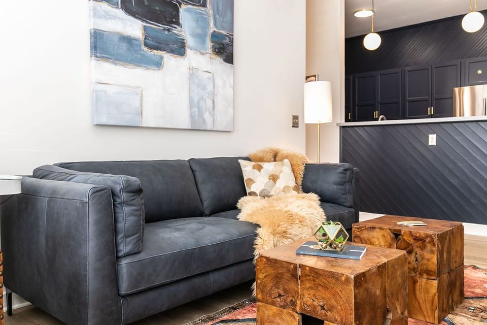 Modern lighting and soft leather for a comforatable and chic stay.