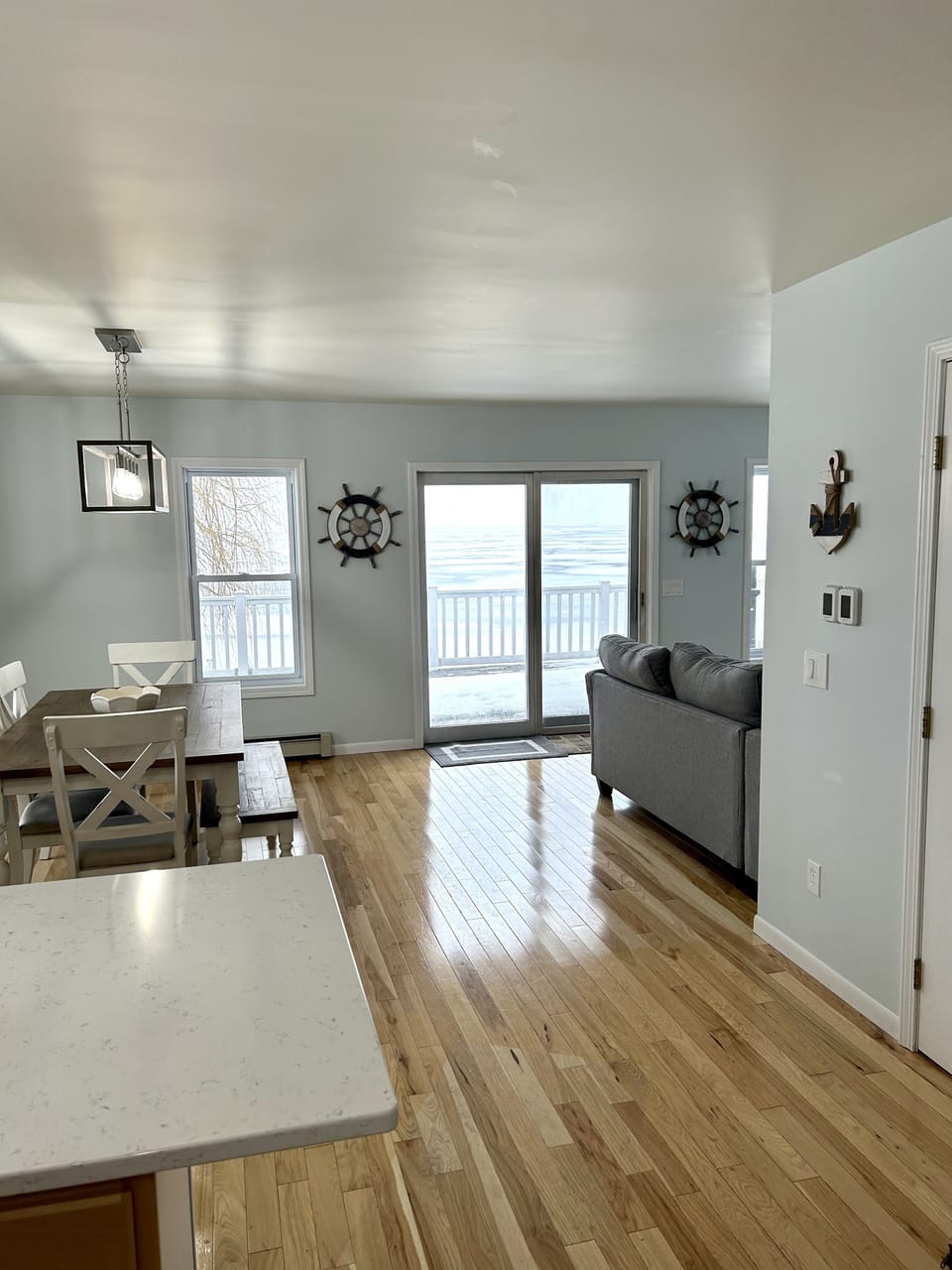 View of the home upon entry and access to the main deck. 