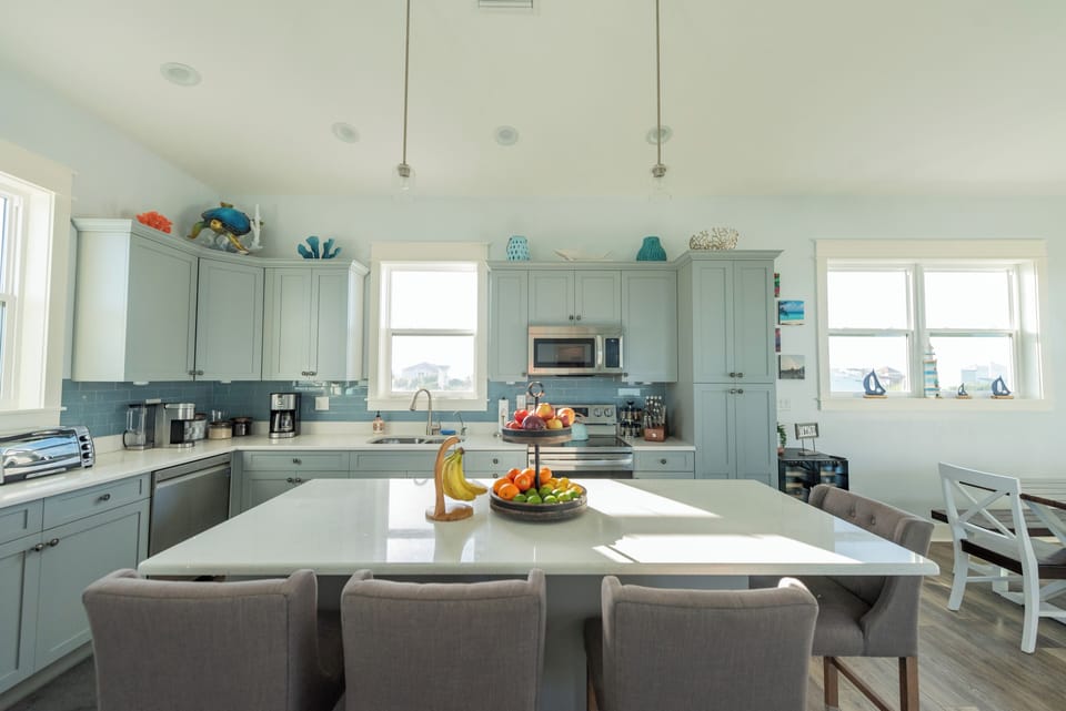 Open Concept Chef's Kitchen with Large Quartz Island and Seating (2)