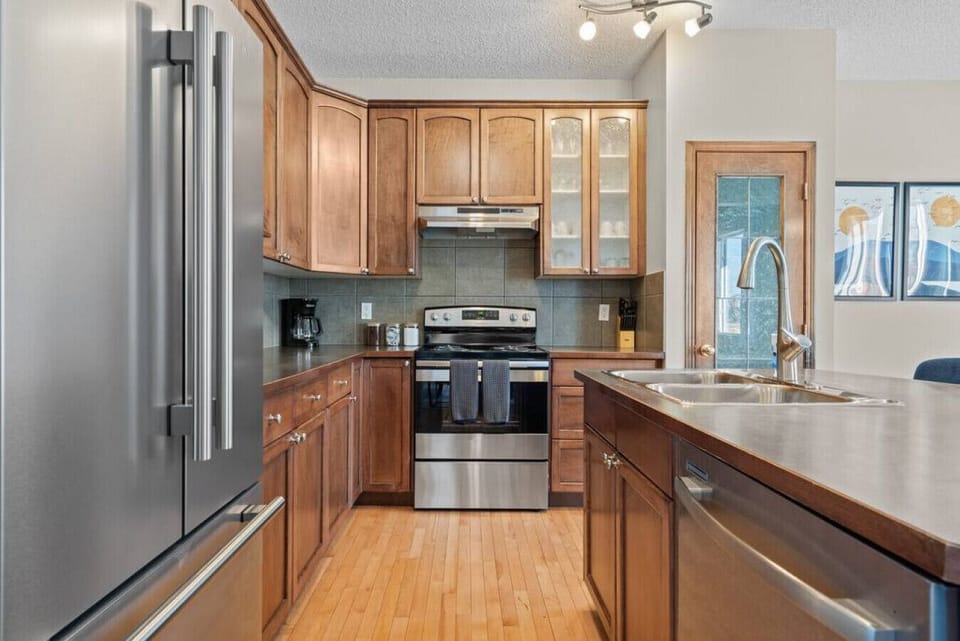 Full kitchen with a drip coffee machine, ground coffee, tea, sugar and basic condiments (ketchup, mustard and relish.)