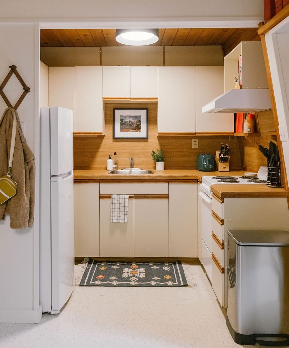 Our small but fully-stocked kitchen has everything you need to prepare meals.