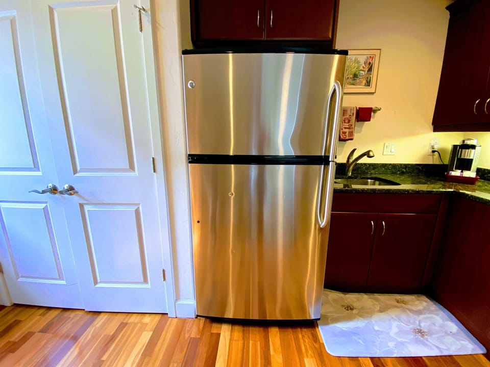 Full sized fridge with automatic icemaker.