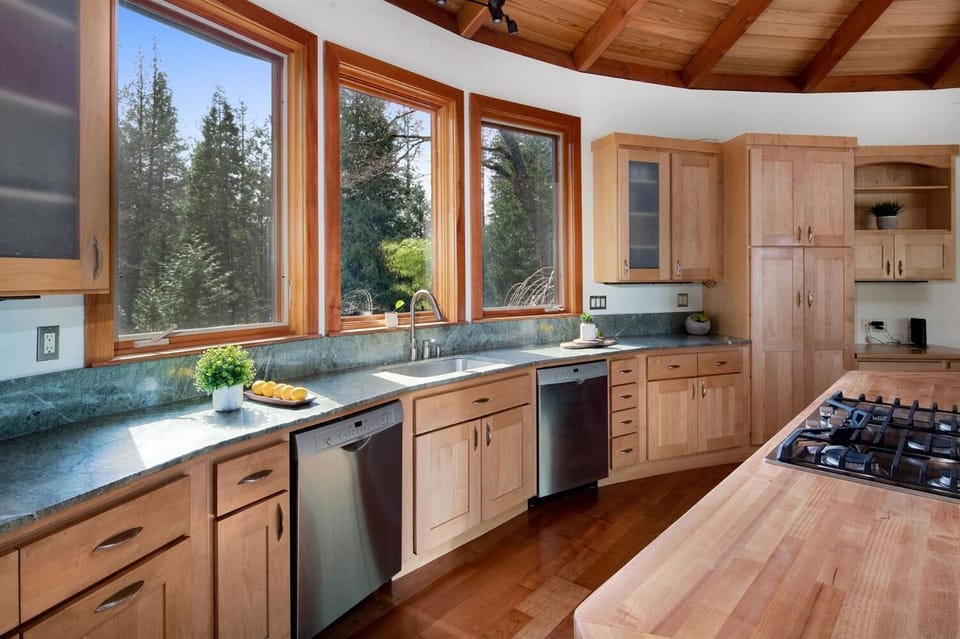 Fully stocked kitchen with two dishwashers 