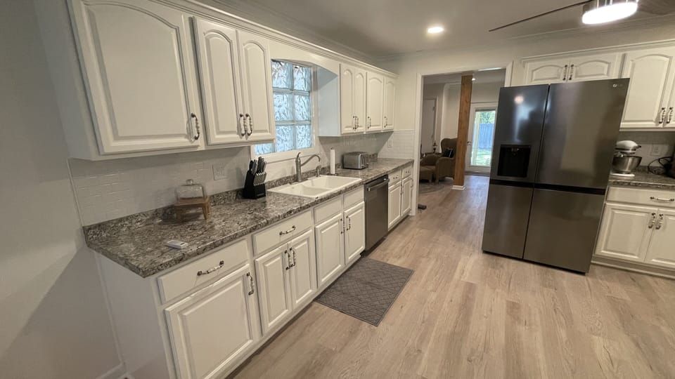 Full kitchen with gas stove and fully stocked appliances