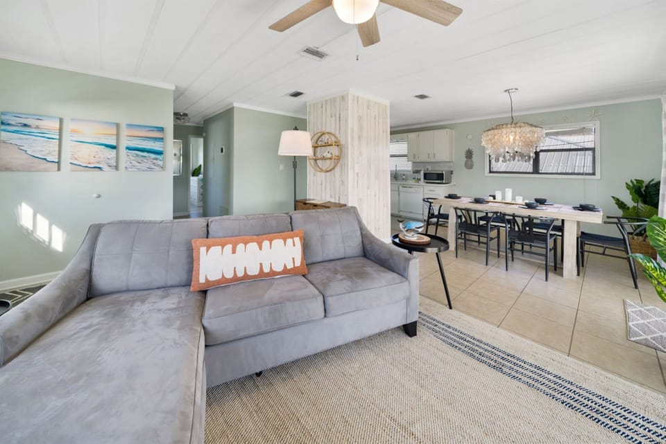 With an open concept design and abundant natural light, this inviting space is perfect for relaxing and unwinding after a day in the sun.