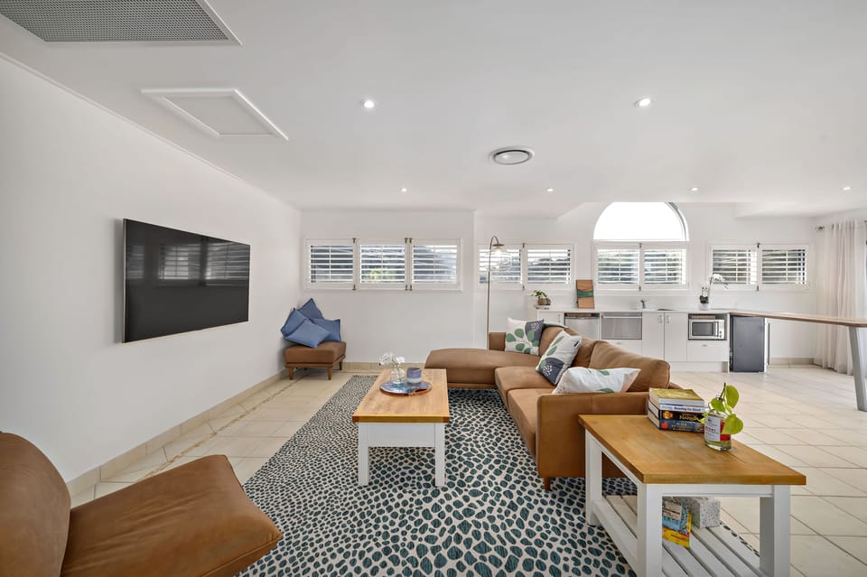 Huge top-level living area, opening out onto the rooftop terrace