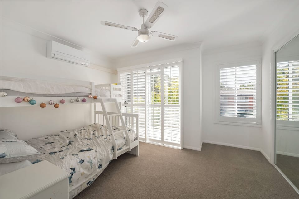 Bedroom 4 with Bunk Beds, built-in wardrobe, a/c and private verandah