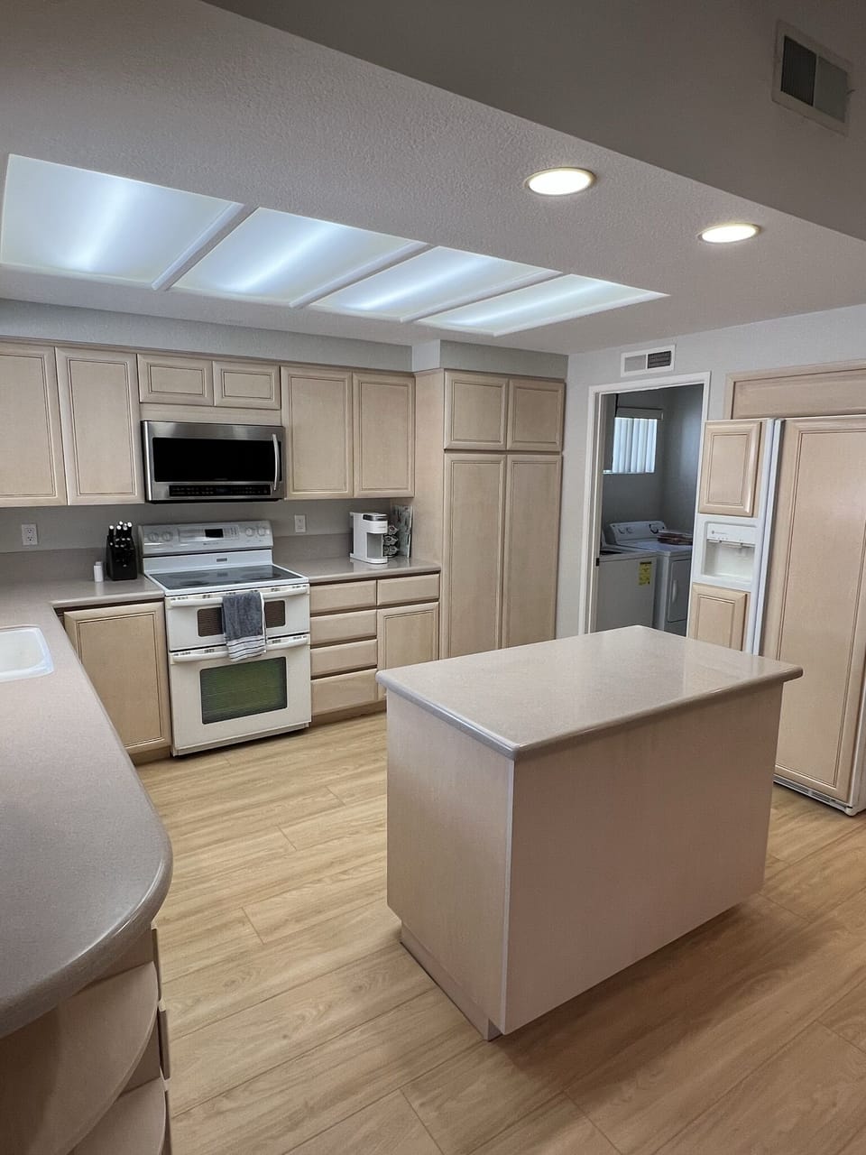 Spacious kitchen completely stocked with pots, pans, microwave, Keurig, etc!