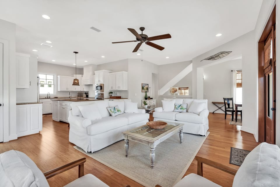 Open concept gathering room with ocean view balcony (second level)
