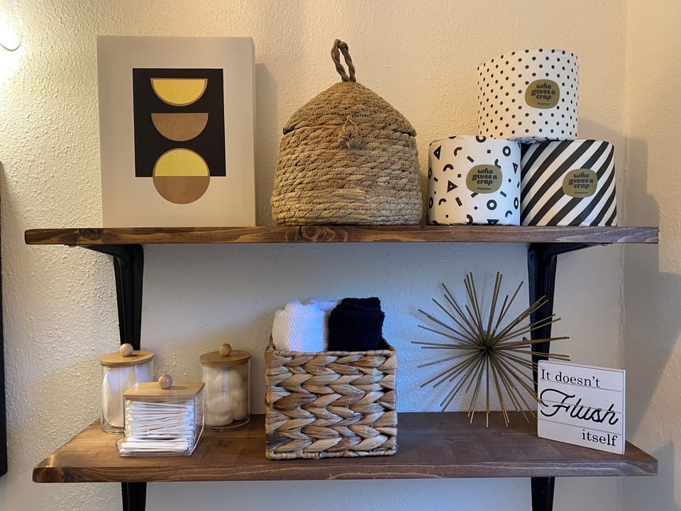 Q-tips, cotton rounds, cotton balls, and feminine products available for use. 
