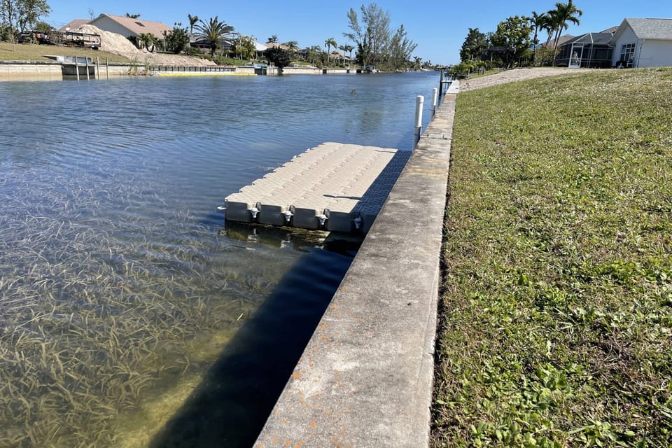 Floating dock where you may launch kayaks into the canal.