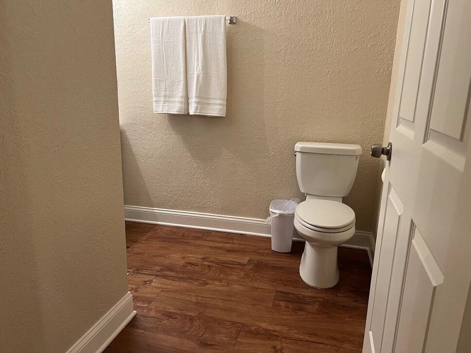 Over-sized walk in shower with shampoo, body wash and conditioner provided