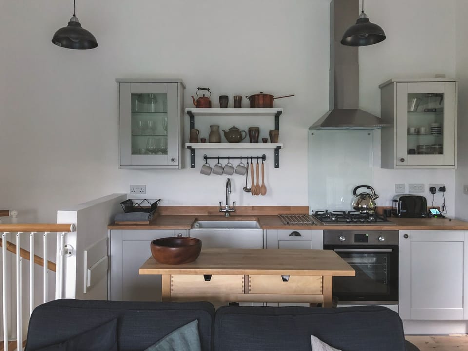 The Kitchen area with dishwasher, full cooking facilites