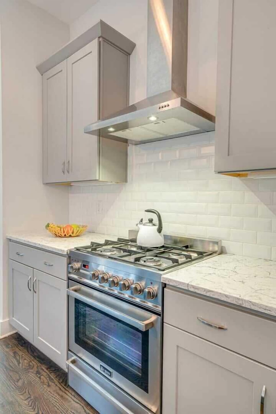 Fully equipped kitchen stocked with your basic cooking essentials complete with breakfast bar seating.