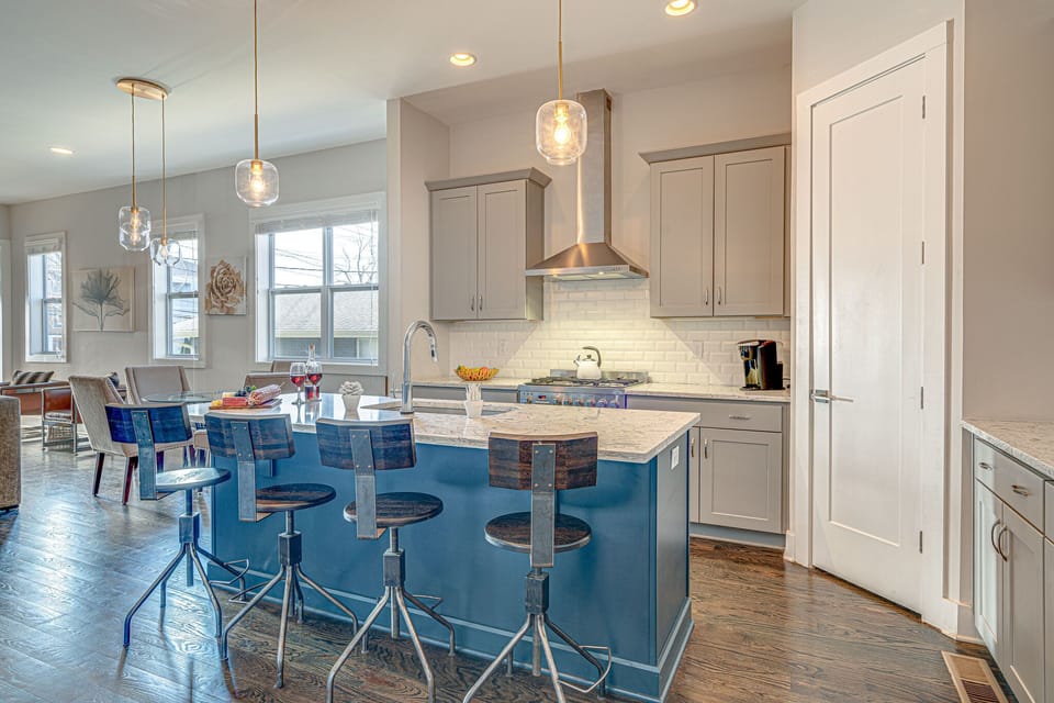 Fully equipped kitchen stocked with your basic cooking essentials complete with breakfast bar seating.