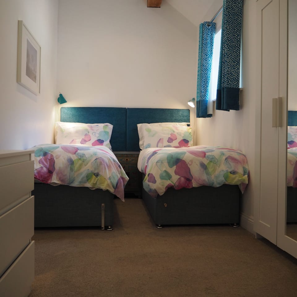 Twin singles in Bedroom 2.  Can be made into King bed