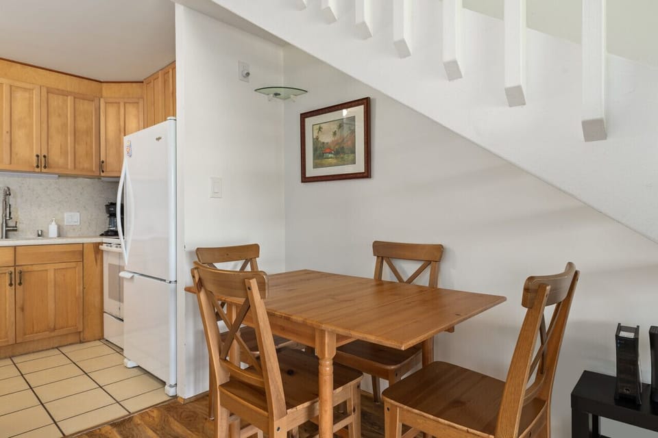 Bright dining nook beside the kitchen for shared meals.