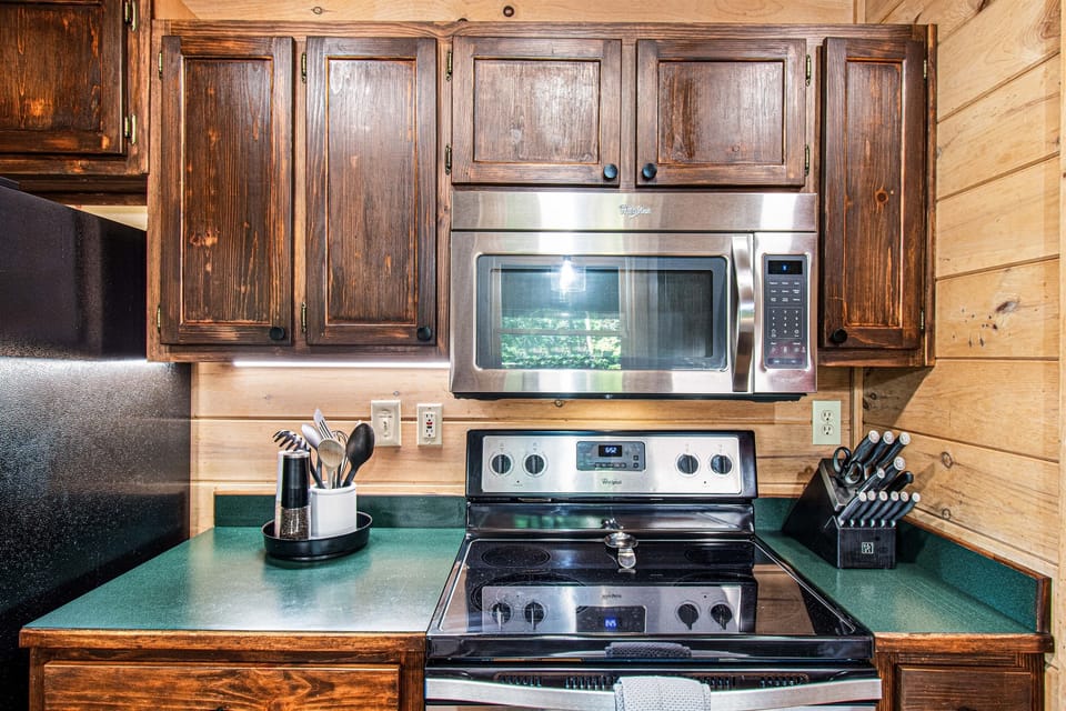 All-Clad pots and pans and cookie sheets provided.