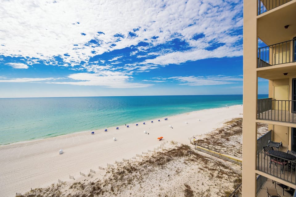 Bask in the beautiful views from your balcony, overlooking the tranquil waters and inviting shoreline