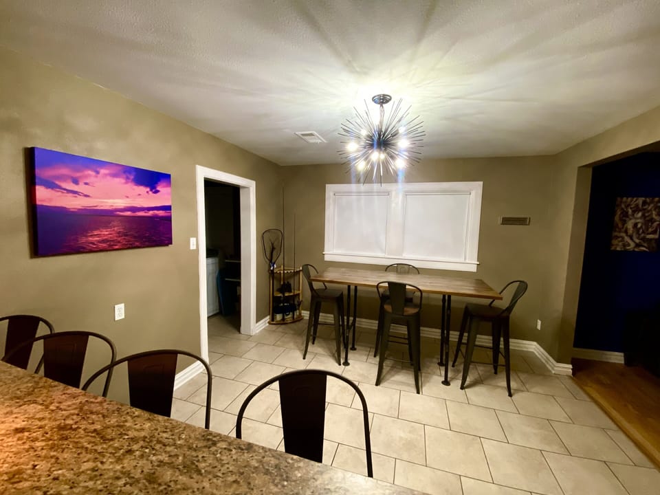 Custom built table for 8 to gather around. Window height so can take in the view